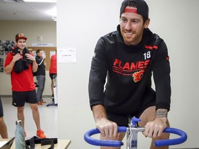 Calgary Flames' James Neal rides an exercise bike during fitness testing prior to training camp in Calgary on September 5, 2018. Calgary Flames captain Mark Giordano intends to pick the brain of newcomer James Neal at various points in the upcoming NHL season. Neal is fresh off long post-season runs the past two seasons reaching the Stanley Cup final with both the Nashville Predators and Vegas Golden Knights. Giordano hopes that rubs off on the Flames who finished out of the playoffs last season.