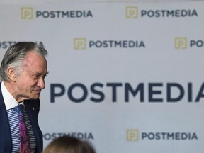 Postmedia CEO Paul Godfrey takes part in the company's annual general meeting in Toronto on January 12, 2017. Postmedia Network Inc. has told Ottawa Citizen and Ottawa Sun staff that it will lock out union employees starting Monday if they reject or refuse to vote on its final contract offer.