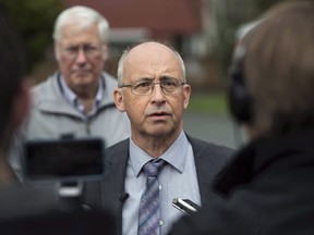 Nova Scotia New Democratic Party leader Gary Burrill speaks to reporters during a campaign stop in Halifax on Wednesday, May 10, 2017. Nova Scotia's NDP say the emergence of a new private Halifax clinic that aims to reduce the strain on the public health-care system is "deeply troubling."