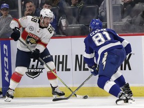 Florida Panthers' Mike Hoffman (68) moves the puck past Tampa Bay Lightning's Erik Cernak (81) during the first period of an NHL preseason hockey game Thursday, Sept. 27, 2018, in Orlando, Fla. A judge has denied a request by the fiancee of former Ottawa Senators winger Hoffman to see evidence related to allegations that she harassed and cyberbullied the wife of the team's former captain.