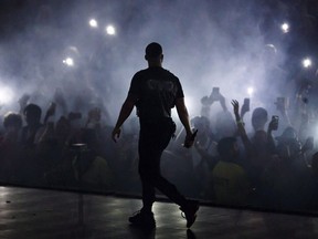 Drake performs during the "Aubrey & The Three Amigos Tour" in Toronto, Tuesday August 21, 2018. Some film and music fans are demanding answers and refunds from the Toronto International Film Festival after Drake failed to appear at an opening-night screening.