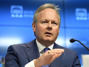 Governor of the Bank of Canada Stephen Poloz speaks during an interest rate announcement at the Bank of Canada in Ottawa on Wednesday, July 11, 2018. Disruptive technologies are making it harder to determine whether, and how quickly, to raise interest rates, Poloz said in a speech Thursday.THE CANADIAN PRESS/Justin Tang