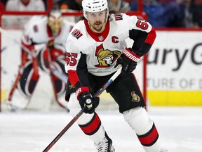 Ottawa Senators' Erik Karlsson (65) moves the puck against the Carolina Hurricanes during the first period of an NHL hockey game in Raleigh, N.C., Jan.30, 2018 Hockey fans in Ottawa reacted to the news that Senators' star defenceman Karlsson had been traded with everything from sorrow to more-measured responses - hate to see him go, but it had to be done.THE CANADIAN PRESS/AP/Karl B DeBlaker, File