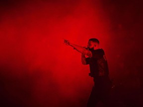 Drake performs during the "Aubrey & The Three Amigos Tour" in Toronto, Tuesday August 21, 2018. Drake offered his apologizes to moviegoers at Toronto International Film Festival, but gave little explanation as to why he bailed on his opening night event in the first place.