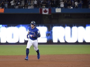 Toronto Blue Jays third baseman Josh Donaldson (20) rounds the bases on a solo home run against the Cleveland Indians during third inning, game four American League Championship Series baseball action in Toronto on Tuesday, October 18, 2016. The Toronto Blue Jays have traded 2015 American League MVP Josh Donaldson to the Cleveland Indians.
