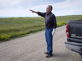 Former Blood Tribe Chief Harley Frank gestures from his truck on disputed land near his home near Spring Coulee, Alta. Thursday, July 5, 2018.