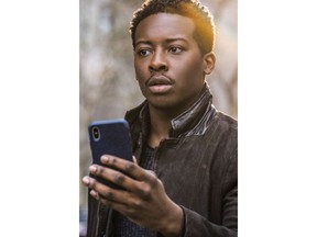 Actor Brandon Micheal Hall is shown in a scene from "God Friended Me" in this undated handout photo. Actor Brandon Micheal Hall's mother is a preacher and he practically grew up in the church, so when he signed on to play an atheist in the new series "God Friended Me," she wasn't enthused.