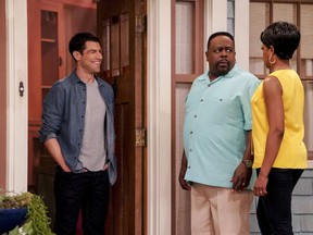 "The Neighbourhood" cast members Max Greenfield, left to right, as Dave Johnson, Cedric the Entertainer as Calvin Butler and Tichina Arnold, as Tina Butler, are seen in an undated handout photo. "The Neighbourhood" will premiere at 8pm EST on Monday, October 1, 2018, on CBS and Global.