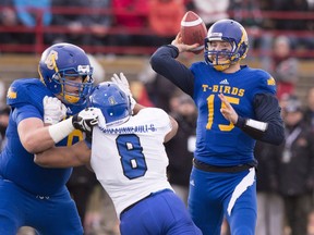 UBC Thunderbirds quarterback Michael O'Connor passes against the Montreal Carabins during first half football action at the Vanier Cup Saturday, November 28, 2015 in Quebec City. For Michael O'Connor, discussing his future is a distraction from his current goal, leading the University of B.C. Thunderbirds to another national championship.