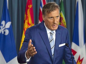 Maxime Bernier responds to questions after announcing he will leave the Conservative party during a news conference in Ottawa, Thursday August 23, 2018. While maverick MP Bernier may not have caucus support for his political party, he has attracted an eclectic group of people to his cause.
