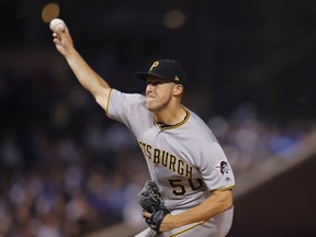 Pittsburgh Pirates' Jameson Taillon pitches against the Chicago Cubs during the first inning of a baseball game Monday, Sept. 24, 2018, in Chicago.