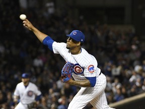 Chicago Cubs relief pitcher Pedro Strop (46) throws the ball against the Milwaukee Brewers during the ninth inning of a baseball game, Tuesday, Sept. 11, 2018, in Chicago. The Cubs won 3-0.