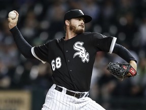 Chicago White Sox starting pitcher Dylan Covey delivers against the Cleveland Indians during the first inning of a baseball game, Monday, Sept. 24, 2018, in Chicago.