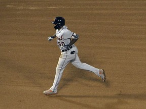 Detroit Tigers' Ronny Rodriguez (60) runs the bases after hitting a two-run home run against the Chicago White Sox during the fourth inning of a baseball game, Wednesday, Sept. 5, 2018, in Chicago.