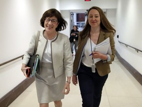 Sen. Susan Collins, R-Maine, left, walks, on Capitol Hill, Monday, Sept. 24, 2018, in Washington. A second allegation of sexual misconduct has emerged against Judge Brett Kavanaugh, a development that has further imperiled his nomination to the Supreme Court, forced the White House and Senate Republicans onto the defensive and fueled calls from Democrats to postpone further action on his confirmation. President Donald Trump is so far standing by his nominee.