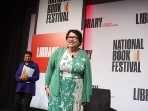 Supreme Court Associate Justice Sonia Sotomayor, right, is escorted onstage by Librarian of Congress Carla Hayden, before talking about her children's book, "Turning Pages: My Life Story", during the Library of Congress National Book Festival in Washington, Saturday, Sept. 1, 2018.
