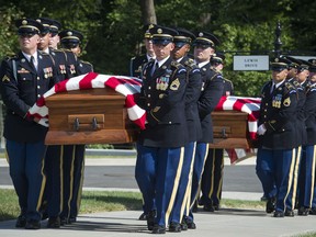 The 3rd Infantry Regiment, also known as the Old Guard, casket teams carry the remains of two unknown Civil War Union soldiers to their grave at Arlington National Cemetery in Arlington, Va., Thursday, Sept. 6, 2018. The soldiers were discovered at Manassas National Battlefield and will be buried in Section 81. Arlington National Cemetery opened the new section of gravesites with the burial.