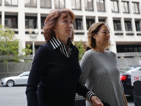 Paul Manafort's wife Kathleen Manafort, left, arrives at federal court in Washington, Friday, Sept. 14, 2018. Former Trump campaign chairman Paul Manafort is expected to plead guilty to federal charges as part of a deal with the special counsel's office.