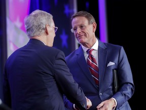 Senate Majority Leader Mitch McConnell of Ky., left, is greeted by Family Research Council president Tony Perkins, right, before speaking to the 2018 Value Voters Summit in Washington, Friday, Sept. 21, 2018.