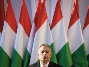 FILE - In this Friday, April 6, 2018 file photo Hungary's Prime Minister Viktor Orban speaks during the final electoral rally of his Fidesz party in Szekesfehervar, Hungary. The European Parliament is set to debate a move toward imposing political sanctions on Hungary for policies that opponents say are against democratic EU values and the rule of law.
