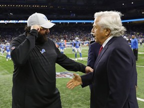 Detroit Lions head coach Matt Patricia, left, meets with New England Patriots team owner Robert Kraft before an NFL football game, Sunday, Sept. 23, 2018, in Detroit.