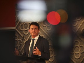 France's former prime minister Manuel Valls pauses during a press conference in Barcelona, Spain to announce his candidacy for mayor of Barcelona on Tuesday, Sept. 25, 2018.