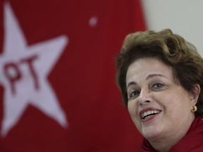 Brazil's former President Dilma Rousseff speaks during a Workers' Party National Executive members meeting to discuss the replacement of jailed presidential candidate, former President Luiz Inacio Lula da Silva, in Curitiba, Brazil, Tuesday, Sept. 11, 2018. While da Silva leads preference polls, he is serving a 12-year sentence for corruption and has been barred from running. The party is expected to announce that vice presidential candidate Fernando Haddad will replace da Silva.