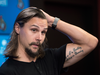 Erik Karlsson talks to media on the Ottawa Senators first day of hockey training camp in Ottawa on Thursday, Sept. 13, 2018, after he was traded by the team to the San Jose Sharks.