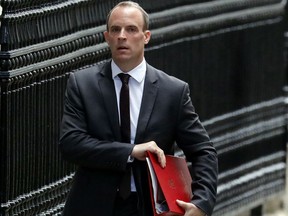 Dominic Raab, Secretary of State for Exiting the European Union, arrives for a cabinet meeting at Downing Street in London, Tuesday, Sept. 4, 2018.