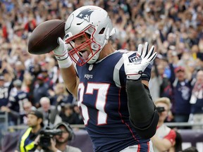 New England Patriots tight end Rob Gronkowski (87) celebrates his touchdown against the Houston Texans during the first half of an NFL football game, Sunday, Sept. 9, 2018, in Foxborough, Mass.