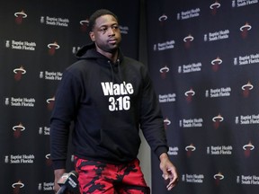 Miami Heat guard Dwyane Wade arrives for a news conference during media day at the NBA basketball team's practice facility, Monday, Sept. 24, 2018, in Miami. This will be Wade's 16th and final season in the NBA.