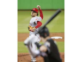 Cincinnati Reds' Luis Castillo pitches to Miami Marlins' JT Riddle during the first inning of a baseball game, Friday, Sept. 21, 2018, in Miami.