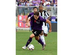 Fiorentina's Federico Chiesa goes for the ball during the Serie A soccer match between Fiorentina and Udinese, at the Artemio Franchi stadium in Florence, Italy, Sunday, Sept. 2, 2018.