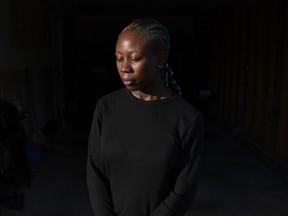 Dazia Lee, 20, outside her home in Charlotte on Monday.