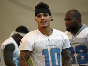 Miami Dolphins wide receiver Kenny Stills looks on during practice at the NFL football team's training facility, Thursday, Sept. 6, 2018, in Davie, Fla. The Dolphins face the Tennessee Titans Sunday.