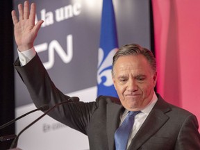 Coalition Avenir du Quebec leader Francois Legault waves to the crowd after his speech to the Chamber of Commerce Friday, September 28, 2018 in Montreal.