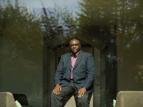 Former Congolese Vice President Jean-Pierre Bemba poses for a photograph after being interviewed by The Associated Press in Waterloo, Belgium, Tuesday, Sept. 11, 2018. Bemba,  a top Congo opposition figure who is barred from December's presidential election is warning that "chaos" will follow if the vote is not transparent and fair.