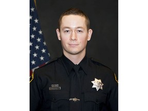 In this undated photo provided by the Sacramento County Sheriff's Office is Deputy Mark Stasyuk. The Sacramento County sheriff's deputy was killed and another wounded in a shootout Monday, Sept. 17, 2018, that started with an argument at a Pep Boys store, authorities said. The suspected gunman and a bystander were wounded, but they were expected to survive, Sheriff Scott Jones said. Stasyuk, 27, was shot in the upper body and killed. Deputy Julie Robertson, 28, was hit in the arm but shot back as the attacker fled. (Sacramento County Sheriff's Office via AP)