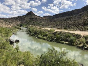 This August 2018 photo shows the Taos Gorge in New Mexico. Hikers have embarked on a 500-mile (805-kilometer) expedition that will traverse New Mexico. The mission: Chart out the best route and identify what challenges might lay ahead as the state moves closer to establishing the Rio Grande Trail. Following in the footsteps of other states, New Mexico is looking to capitalize on its vistas, mild weather and culture with the creation of a long-distance trail along one of North America's longest rivers.