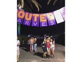 In this Oct. 1, 2017 photo provided by Jessica Ha is Ha, far right, and friends at the Route 91 country music festival in Las Vegas. The 23-year-old Newport Beach, Calif., resident, Ha and her friends managed to make it out of the festival without serious physical injuries. But emotionally and mentally, they're still processing what happened, and they haven't talked much about that night since they left Las Vegas the day after the shooting. "It's a tragedy that has completely changed my life, for the rest of my life," Ha said. (Jessica Ha via AP)