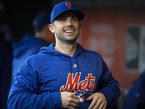 New York Mets infielder David Wright hangs out in the dugout before the team's baseball game against the San Francisco Giants, Friday, Aug. 31, 2018, in San Francisco.
