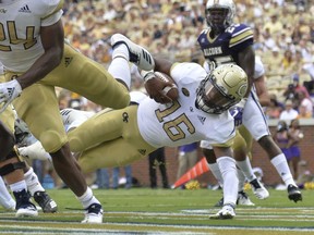 Georgia Tech quarterback TaQuon Marshall (16) dives into the end zone for a touchdown in the first half of an NCAA college football game against Alcorn State  Saturday, Sept. 1, 2018, in Atlanta.