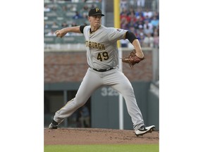 Pittsburgh Pirates' Nick Kingham pitches against the Atlanta Braves during the first inning of a baseball game Sunday, Sept. 2, 2018, in Atlanta.