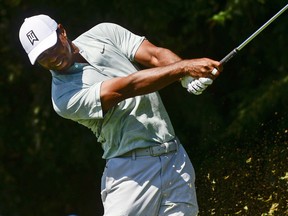Tiger Woods tees off to the second hole during the second round of the Tour Championship golf tournament, Friday, Sept. 21, 2018, in Atlanta.