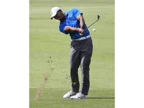 Tiger Woods hits from the first fairway during the third round of the Tour Championship golf tournament Saturday, Sept. 22, 2018, in Atlanta.