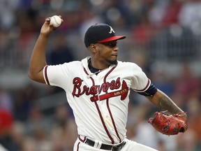 Atlanta Braves starting pitcher Julio Teheran works against the Philadelphia Phillies during the first inning of a baseball game Friday, Sept. 21, 2018, in Atlanta.