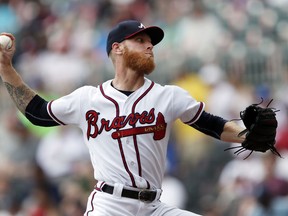 Atlanta Braves starting pitcher Mike Foltynewicz works against the Philadelphia Phillies in the first inning of a baseball game Saturday, Sept. 22, 2018, in Atlanta.