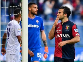 FILE  -  In this  Sunday, May 6, 2018 file photo Genoa forward Giuseppe Rossi celebrates after scoring his side's first goal during the Italian Serie A soccer match between Genoa and Fiorentina at the Luigi Ferraris stadium in Genoa, Italy. Italy's anti-doping agency Nado Italia announced on Tuesday Sept. 25, 2018 that Rossi will stand trial next week after testing positive for and eye drug that can be used as a masking agent.