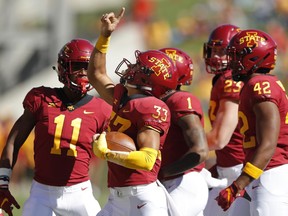 Iowa State defensive back Braxton Lewis (33) celebrates with teammates after intercepting a pass during the first half of an NCAA college football game against Akron, Saturday, Sept. 22, 2018, in Ames, Iowa.