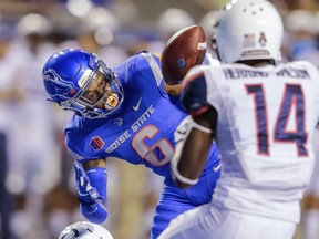 Boise State wide receiver CT Thomas (6) juggles the ball while making a reception against Connecticut in the first half of an NCAA college football game, Saturday, Sept. 8, 2018, in Boise, Idaho.